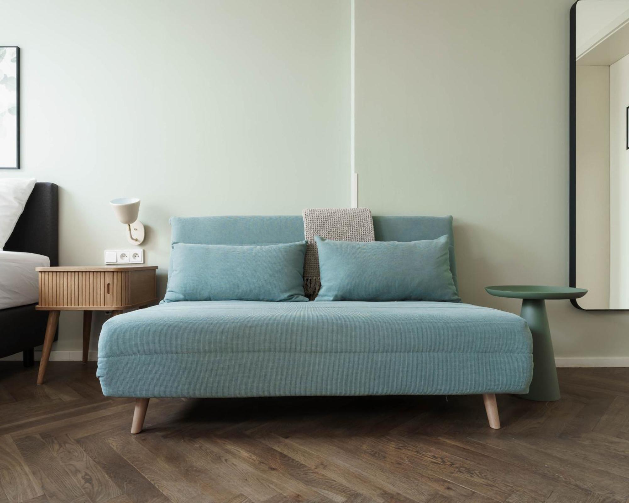 Zimmer mit Queensize-Bett und Schlafsofa